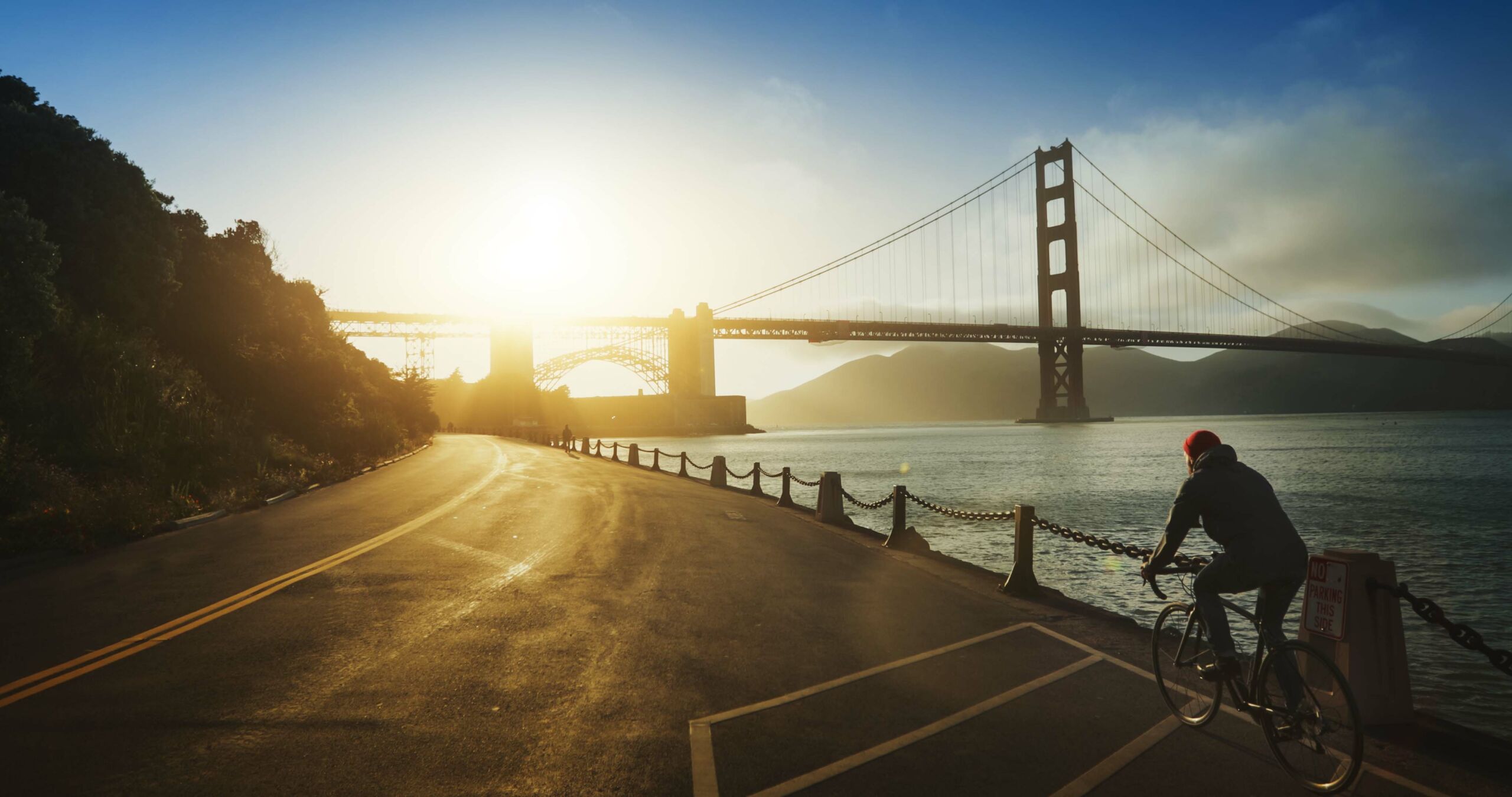 commuter With Road Racing Bicycle And Golden Gate Bridge